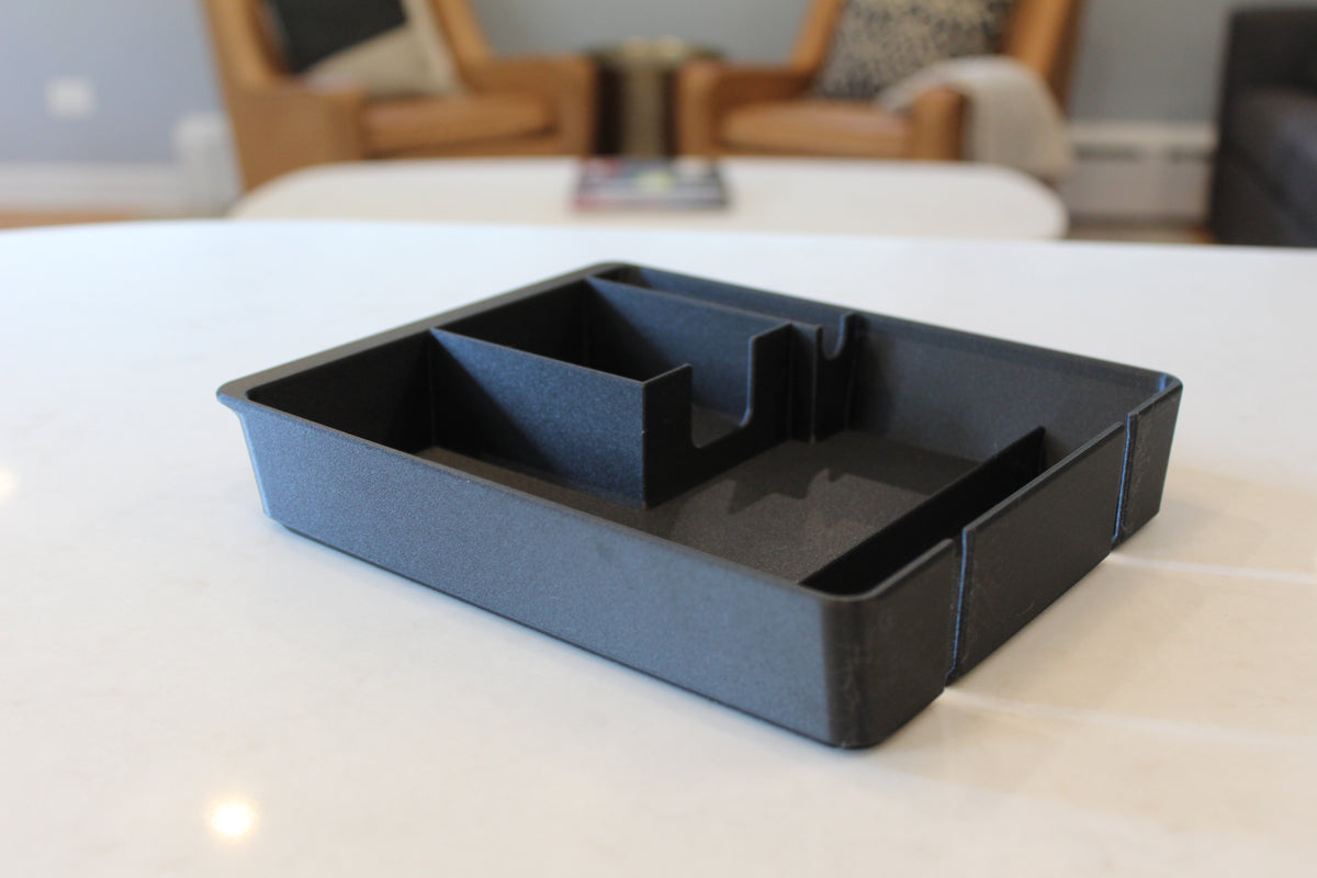 Squared Away Tray Fitted on a counter, showing the glasses channel, card holder and open compartments