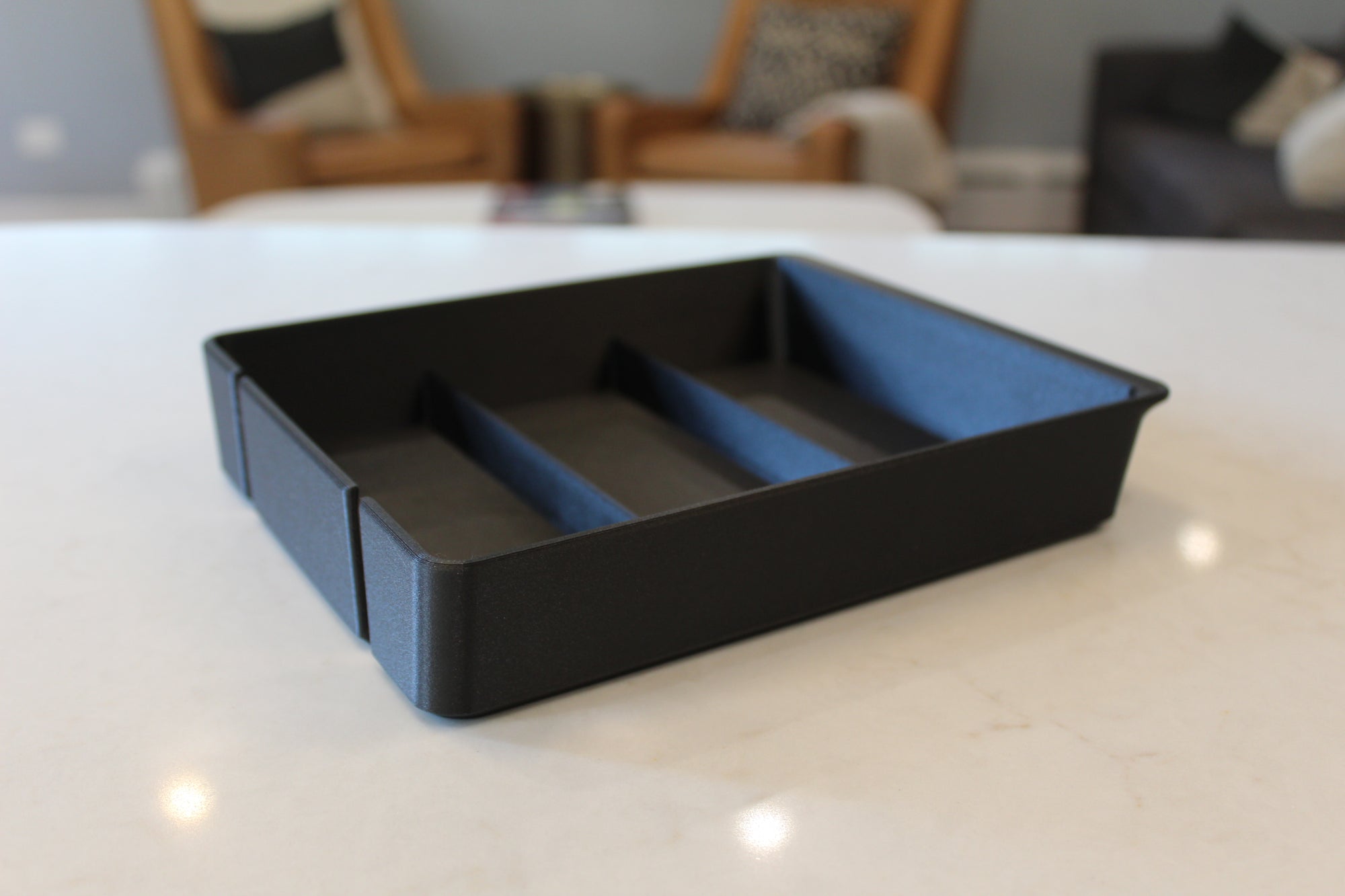 Top-down view of the three-compartment R2 center console organizer