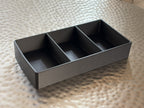 Slide-Out Drawer Tray on its own, showing three open sections and a matte black finish